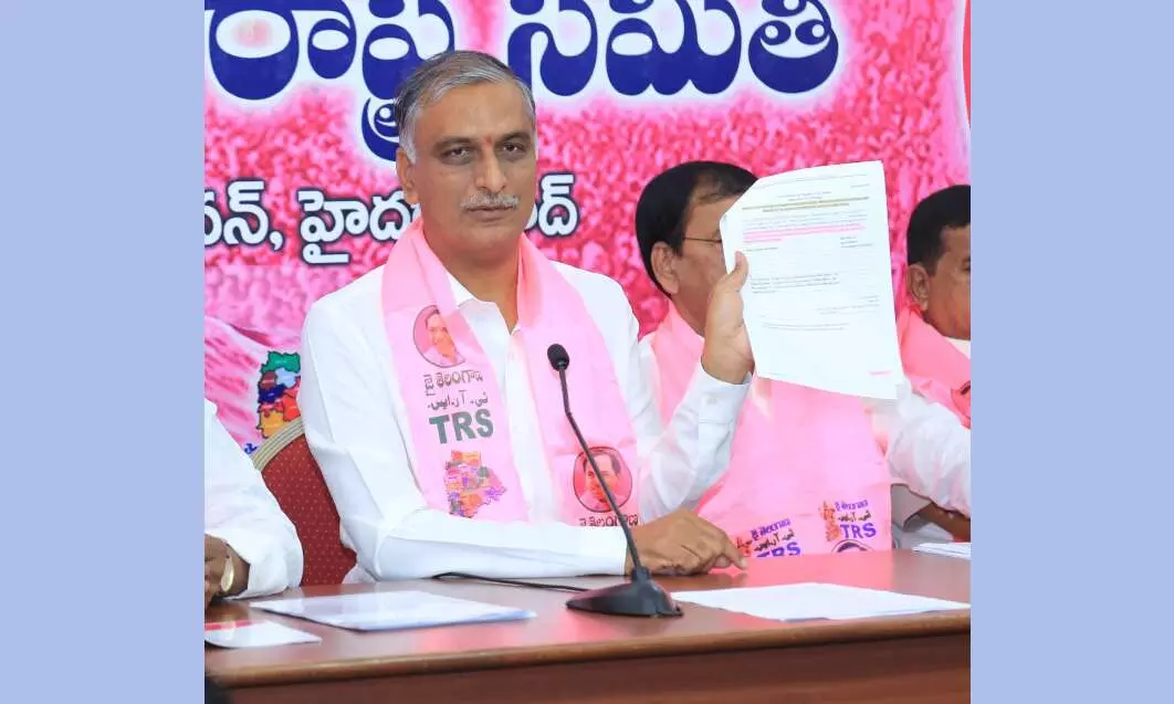 Harish Rao showing letters from Government of India