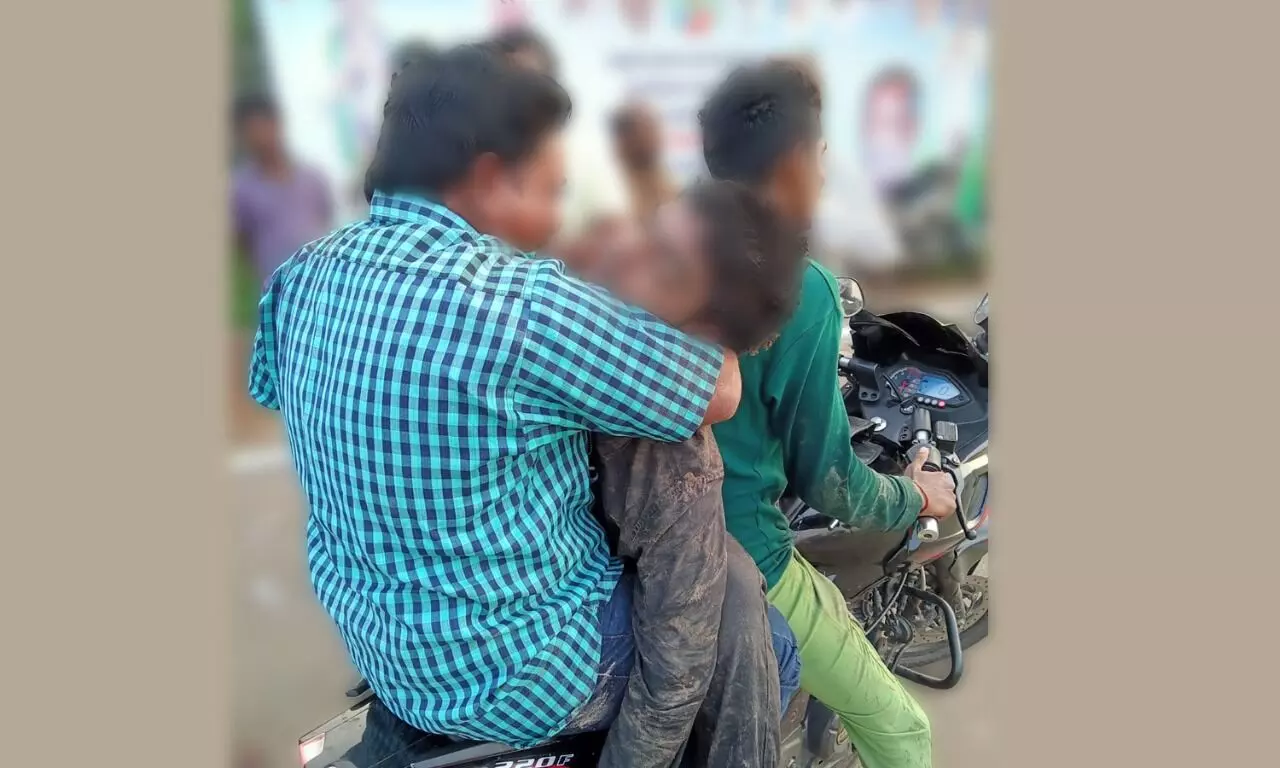 Denied ambulance, man carries nephews body on bike in Machilipatnam